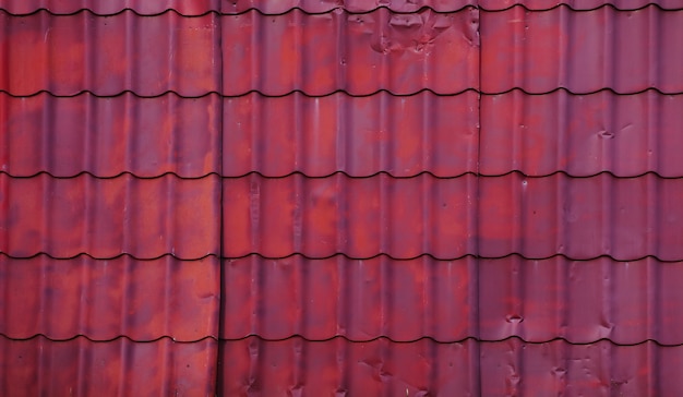 Old metal roof for a private house. wallpaper