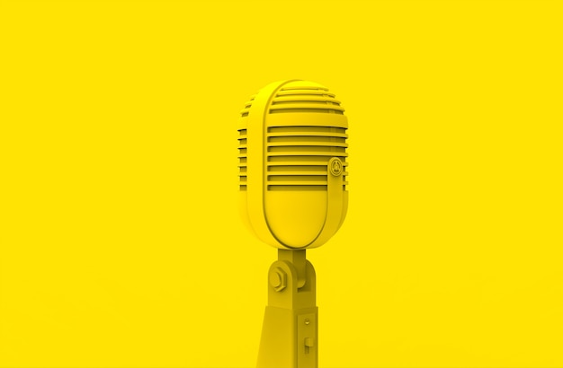 Old microphone on yellow background