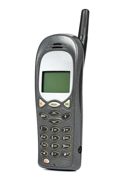 Photo old mobile phone on white background