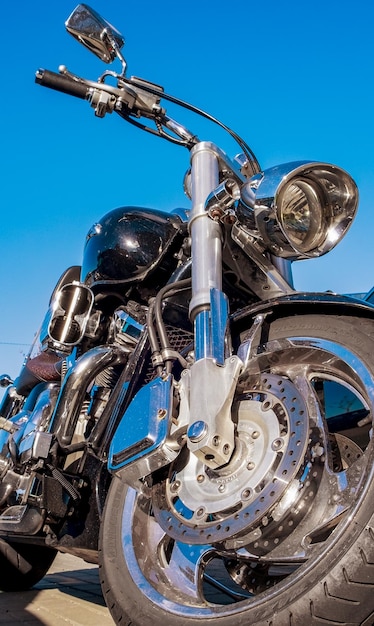 Old motorcycle view from below against the sky