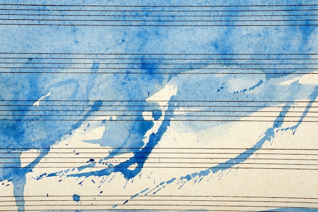 블루 수채화 물감 페인트에 오래 된 음악 시트입니다. 블루스 음악 개념. 추상 블루 수채화 배경입니다.
