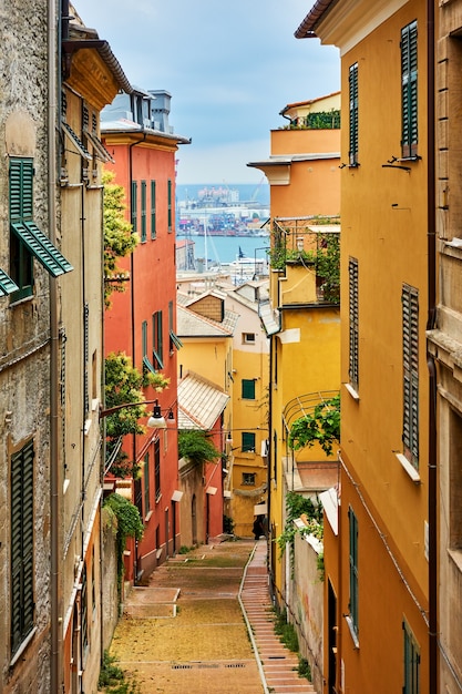 Old narrow street in Genoa city, Italy