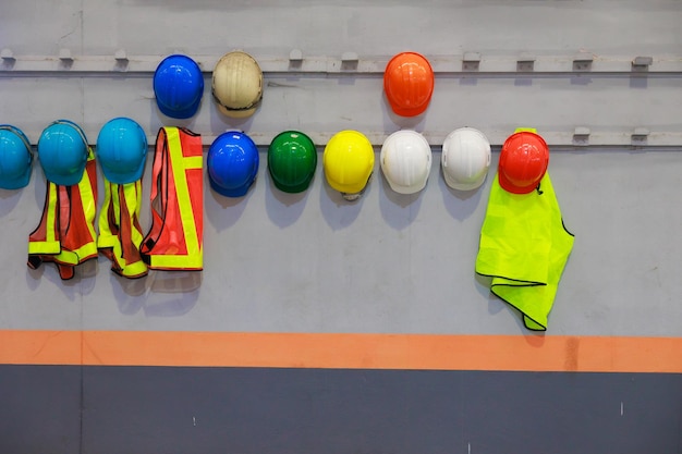 Old and new colorful construction protective helmets or safety hardhat helmet Safety first