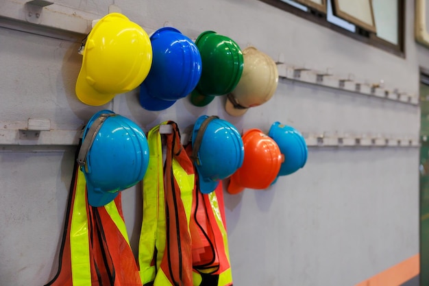 Old and new colorful construction protective helmets or safety hardhat helmet Safety first