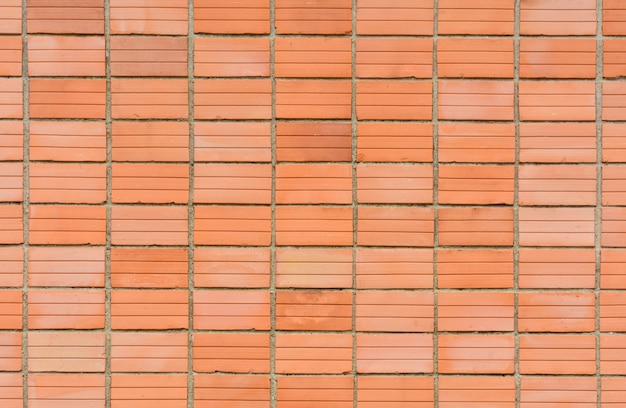 오래 된 주황색 벽돌 벽 패턴