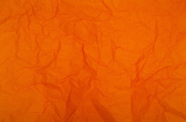 古いオレンジ色の紙の背景