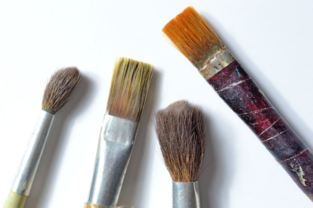 Old paint brushes.