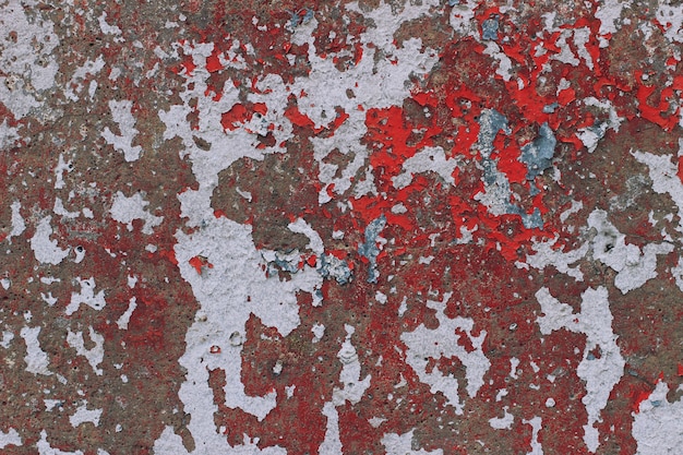 An old paint on a concrete surface close up