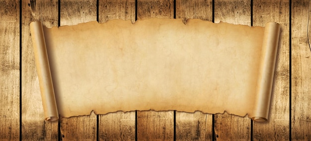 Old paper horizontal banner parchment scroll on a wood\
board