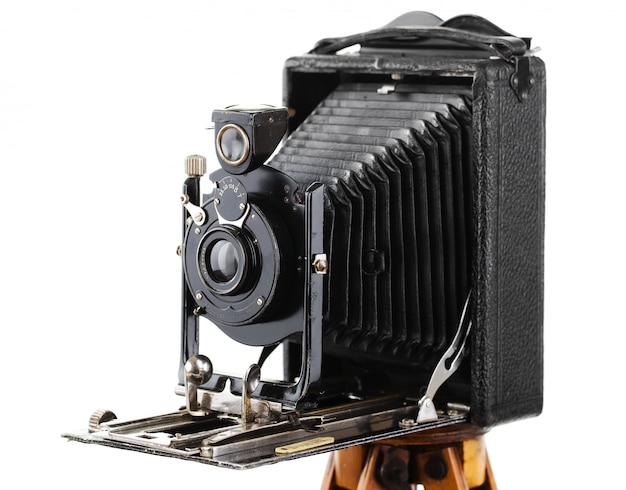 Old photo camera on a white background