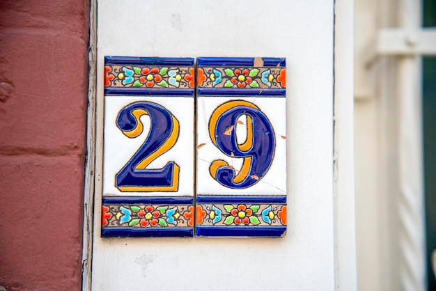 An old porcelain sign with the number 29