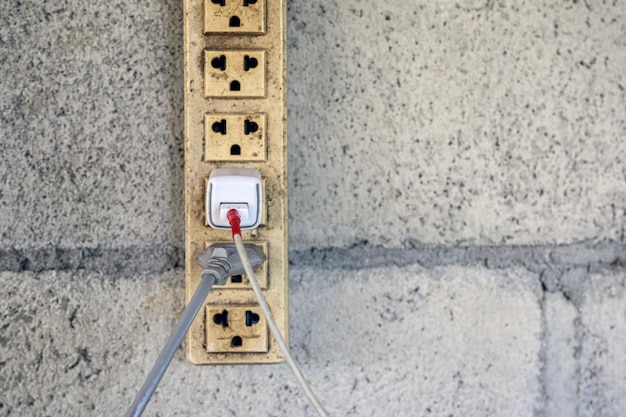 Old power electric plug with charging cable