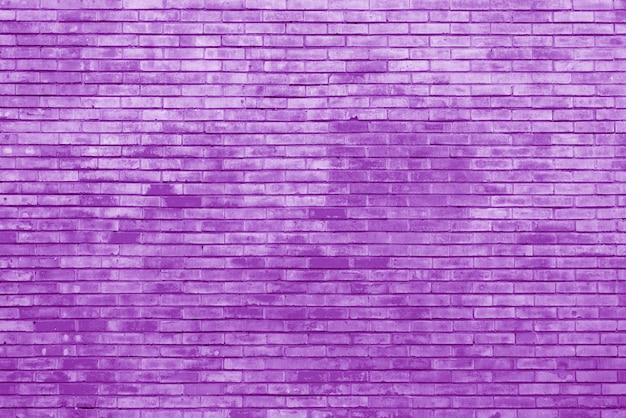 Photo old purple brick wall background