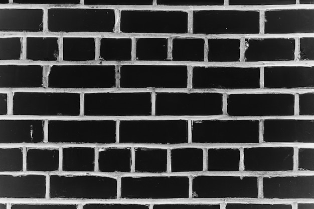 Old realistic brick wall made of black brick in different shads