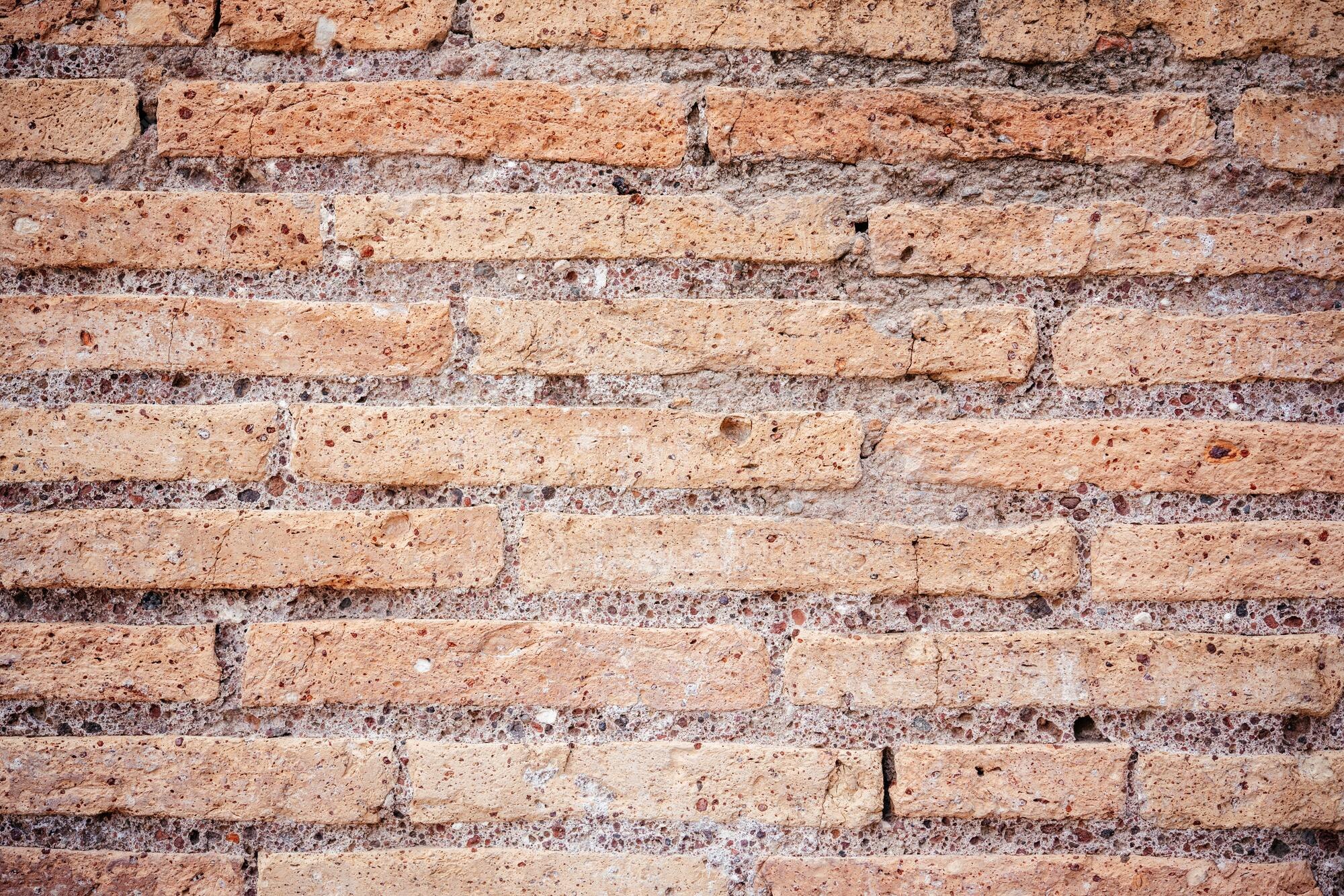 Premium Photo | An old red brick wall background
