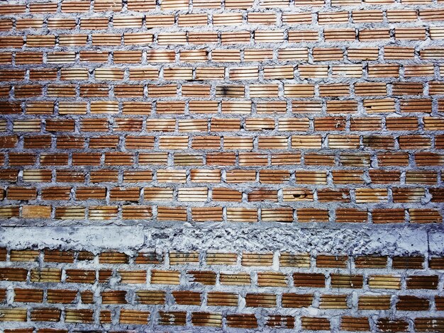 Old red brick wall for graphic design or wallpaper