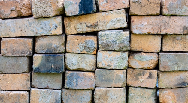 Foto la vecchia struttura del muro di mattoni rossi