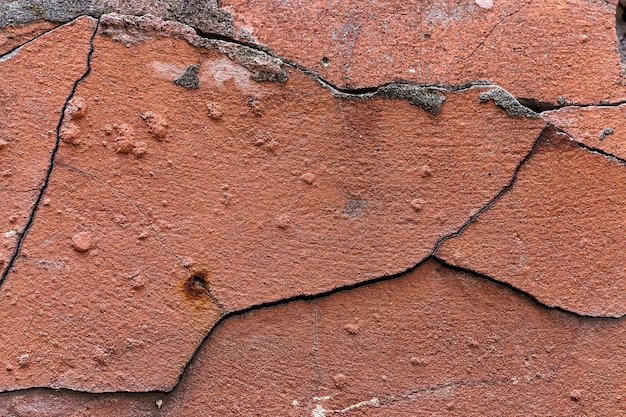 Old red cracked wall