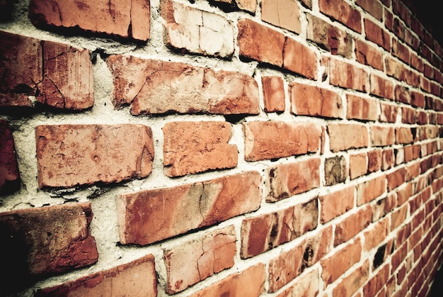 Old red textured brick wall