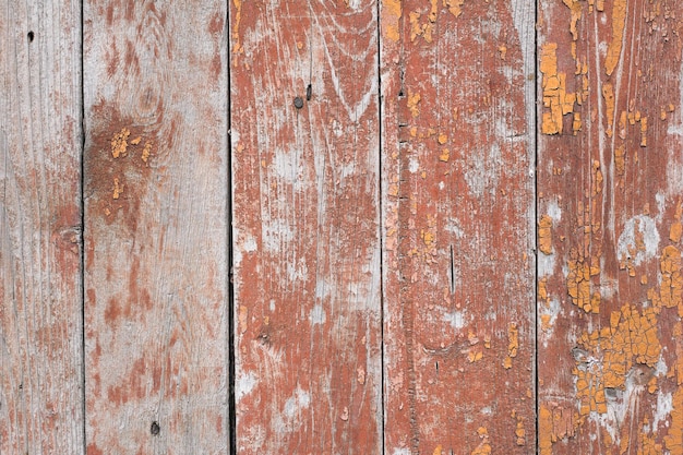 Old red wooden board. Timber texture. Retro background