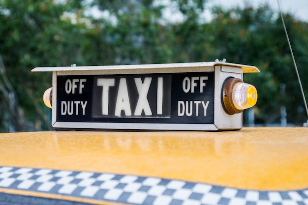 Old retro taxi on the streets waiting