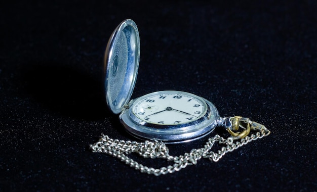 old retro watch in the dark old retro watch on black background watch on black antique watch