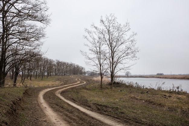 Old road near the river landscape russia