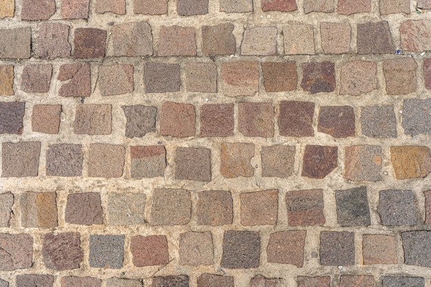 Old road paved with granite stones