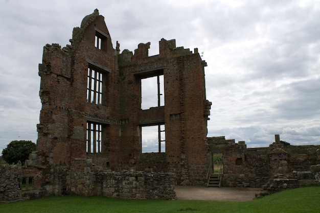 Old ruin building against cloudy sky