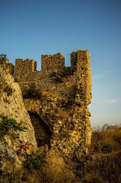 Old ruins against clear blue sky