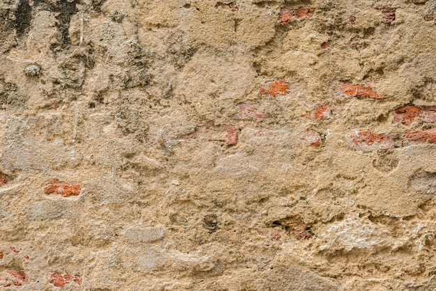 Old ruins brick wall with concrete cracked