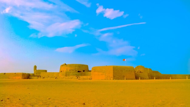 Old ruins of fort against blue sky