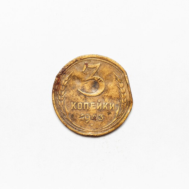 Old Russian CCCP coin of 1943. Isolated on white surface.