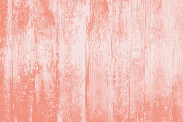 Photo old rustic wooden background  toned in  coral pink.