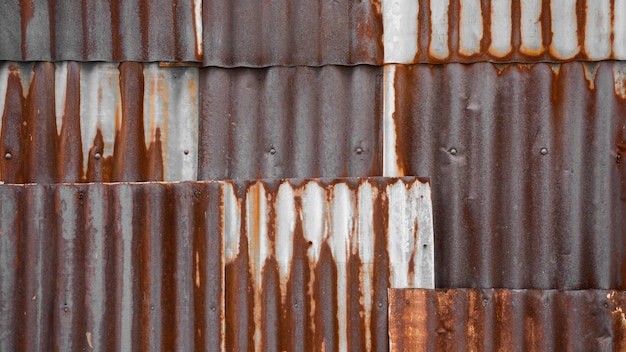 Old and rusty brown galvanized iron roof texture