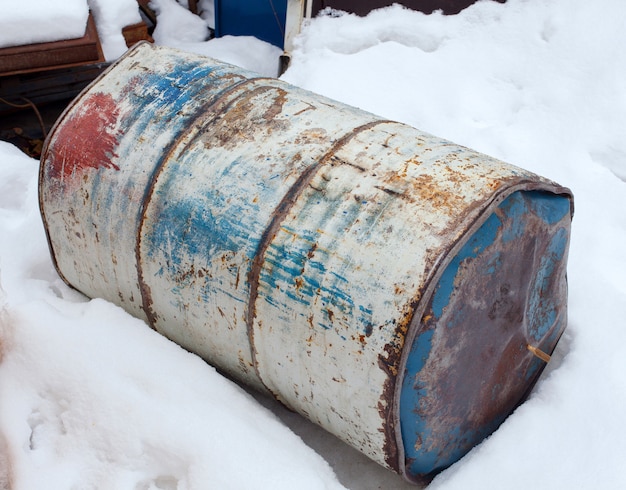 Old rusty metal barrel