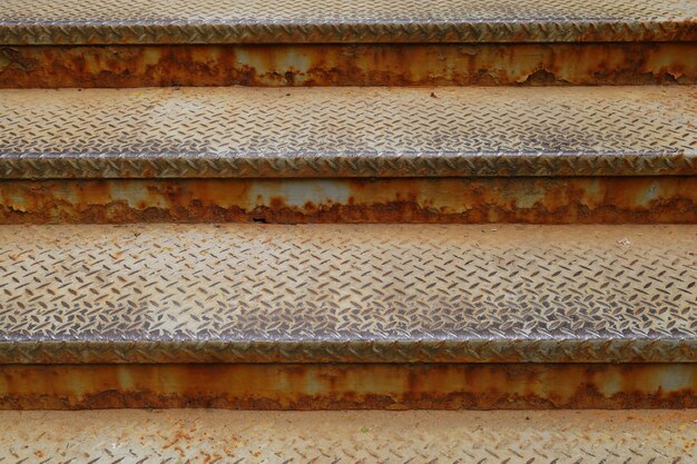 Old rusty and metal stairs close-up