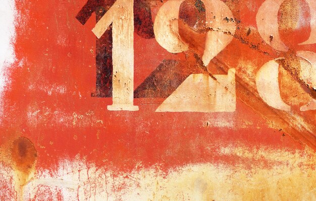 Old rusty painted metal wall background with numbers