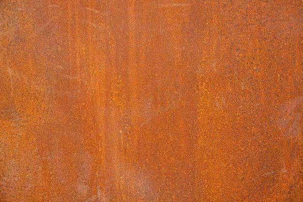 Foto vecchio fondo astratto dipinto metallico rosso arrugginito.