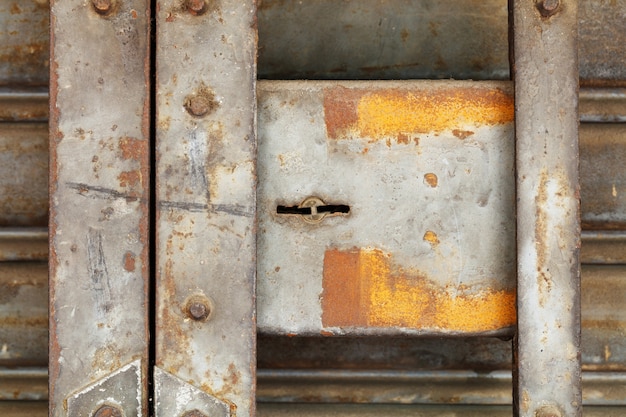 Photo old and rusty steel shutter door