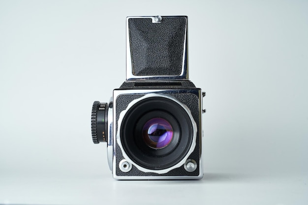 Old school medium format film camera on white background