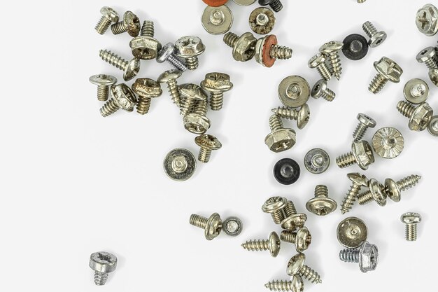 Old screws on the white background