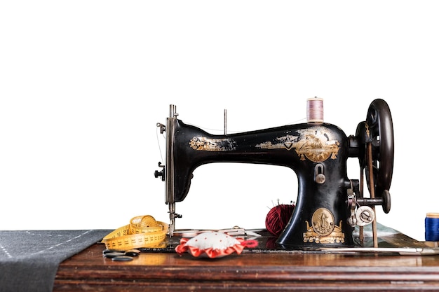 The old sewing machine on a white background