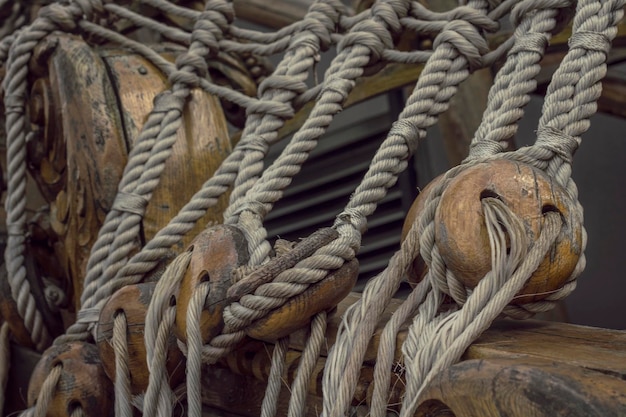 Old ship rope on a wooden sailing ship close up