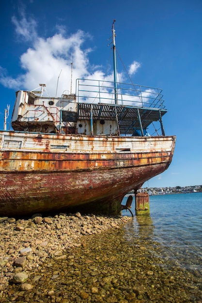 Old shipwreck standing on the beach in brittany france