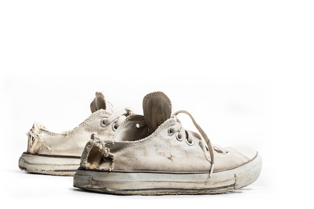 Photo old sneakers isolated on white