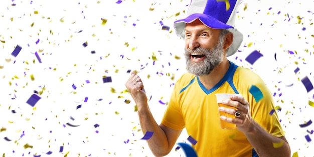 Old soccer fun celebrating win Hold beer Happiness emotion portrait around confetti and tinsel