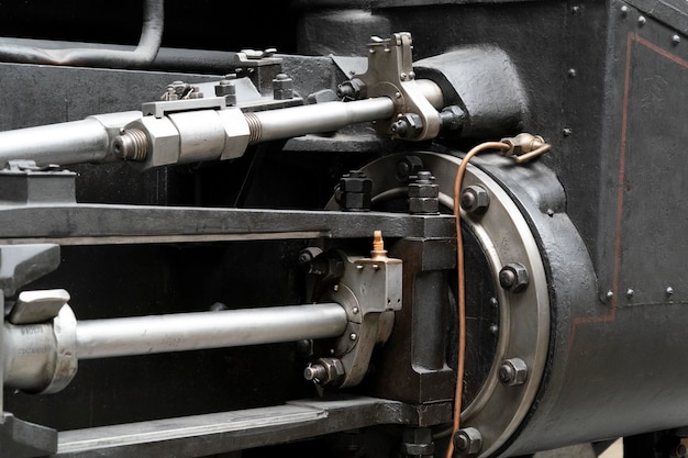 Photo old steam train wheels detail