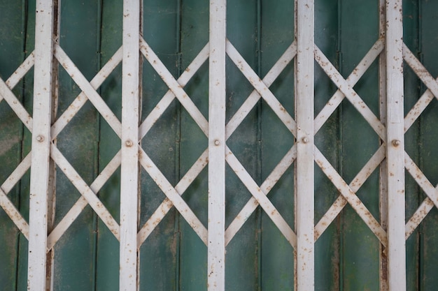 Old steel door texture pattern or steel door background with rusty metal