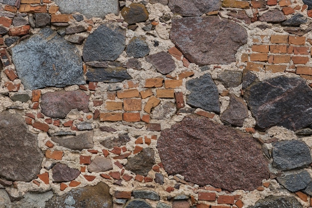 古い石とレンガの壁の背景